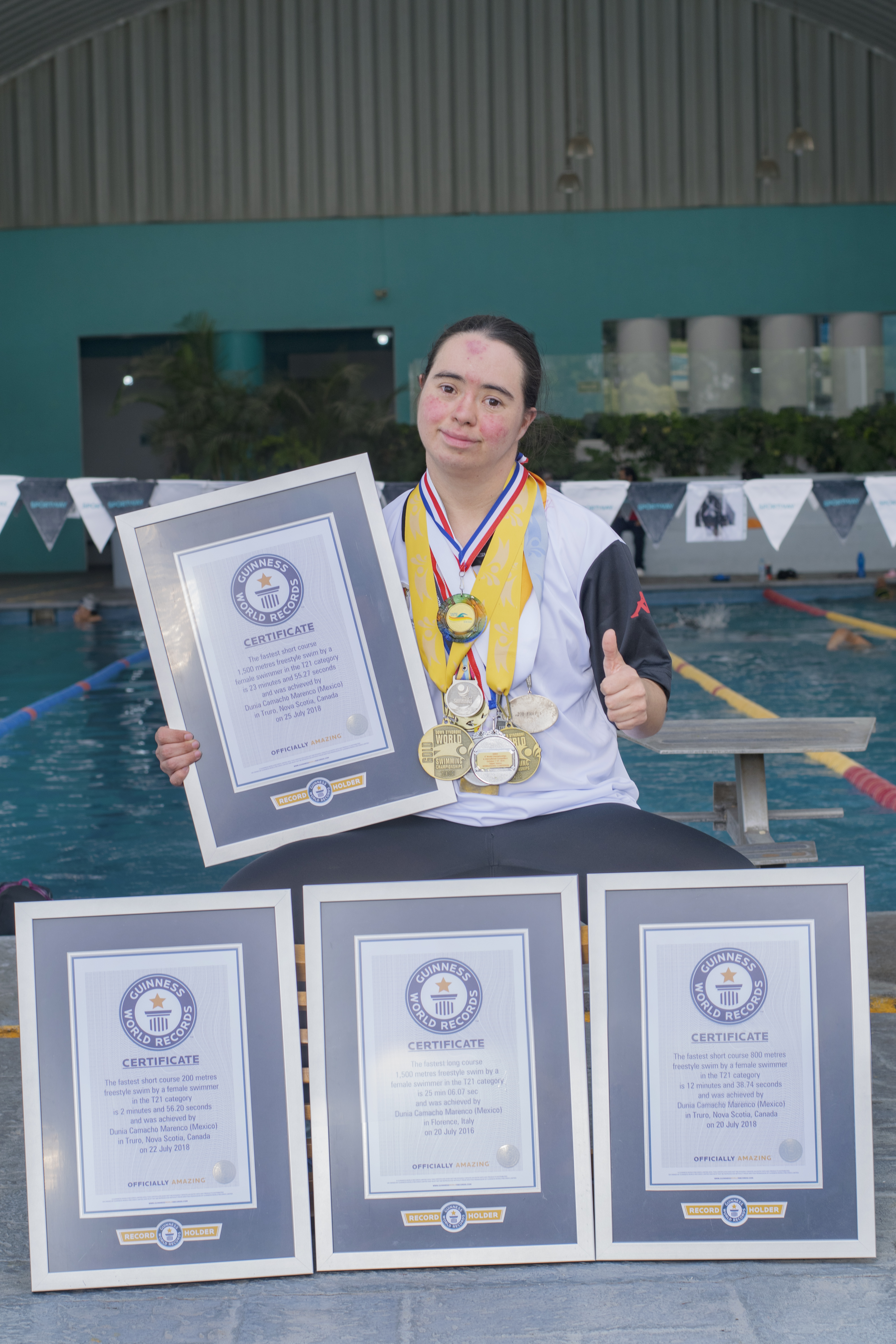 Dunia-with-gwr-certificates-in -the-pool